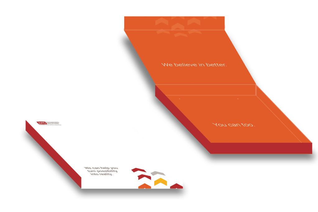 A 3D mock-up of a 9"x9"x1" square box for the Maars Living Walls quick-ship program launched by APG Office Furnishings. It shows the box when it is both closed and open. 

The outside lid of the box is white and the sides are red. When closed, the lid reads "We can help you turn possibility into reality." 

The inside of the box is orange. When open, the lid reads "we believe in better" while the bottom of the box reads "you can too."